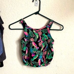 This is a cropped tank top with birds and leaves it has such a cute design on it